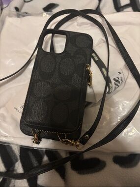 Black Monogram Crossbody Phone Case.  Very good condition.